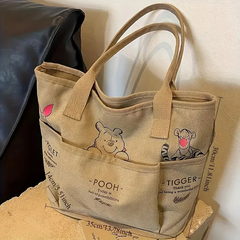 The Mesuca Women Large Capacity Canvas Tote Bag Multi‑pocket Cartoon Animal Print Handbag Casual Shoulder Bag Daily Work Shopping Purse