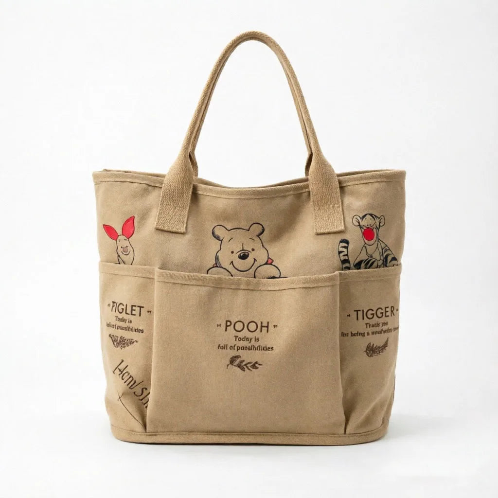 The Mesuca Women Large Capacity Canvas Tote Bag Multi‑pocket Cartoon Animal Print Handbag Casual Shoulder Bag Daily Work Shopping Purse